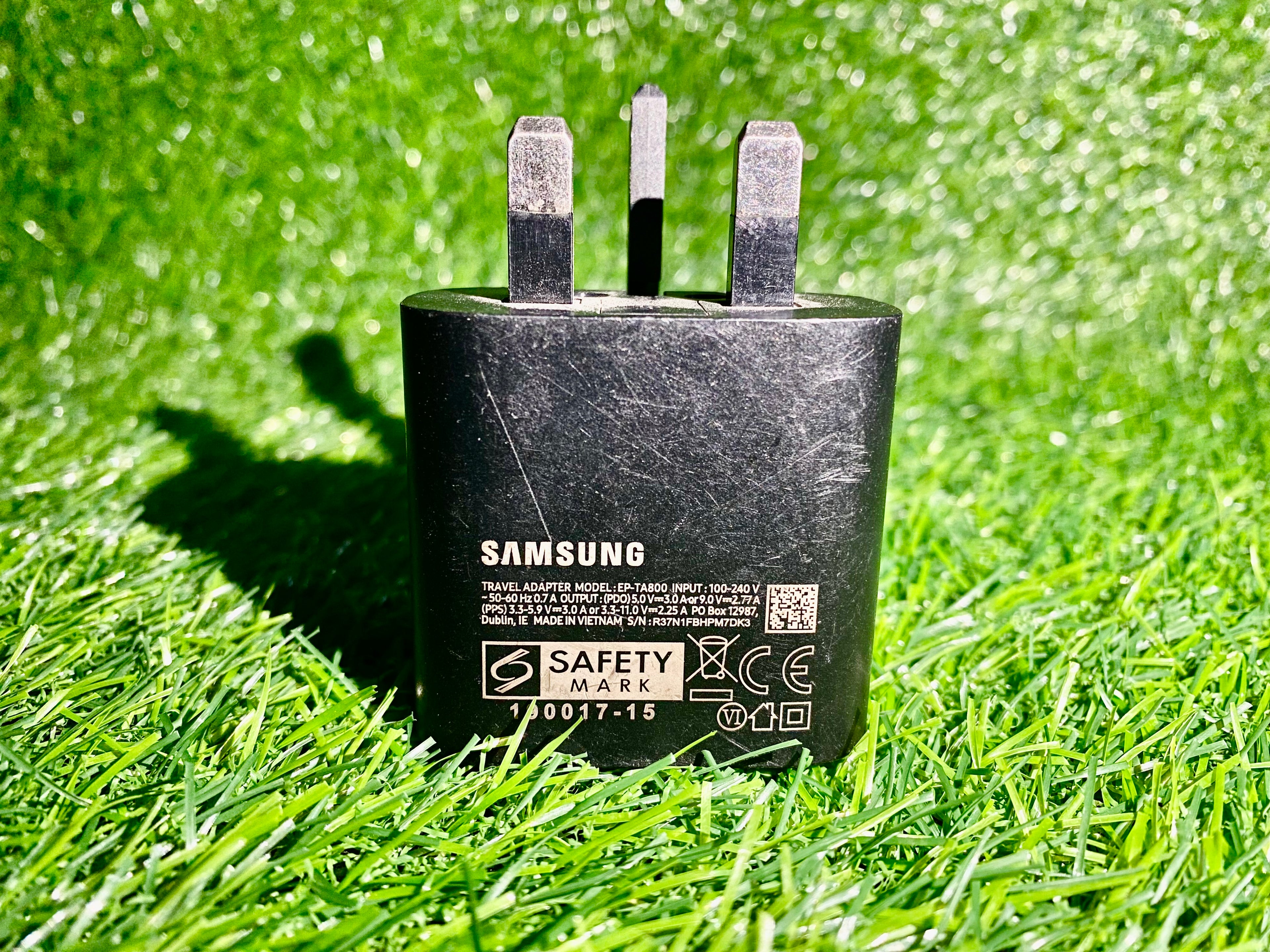 Samsung charger on grass